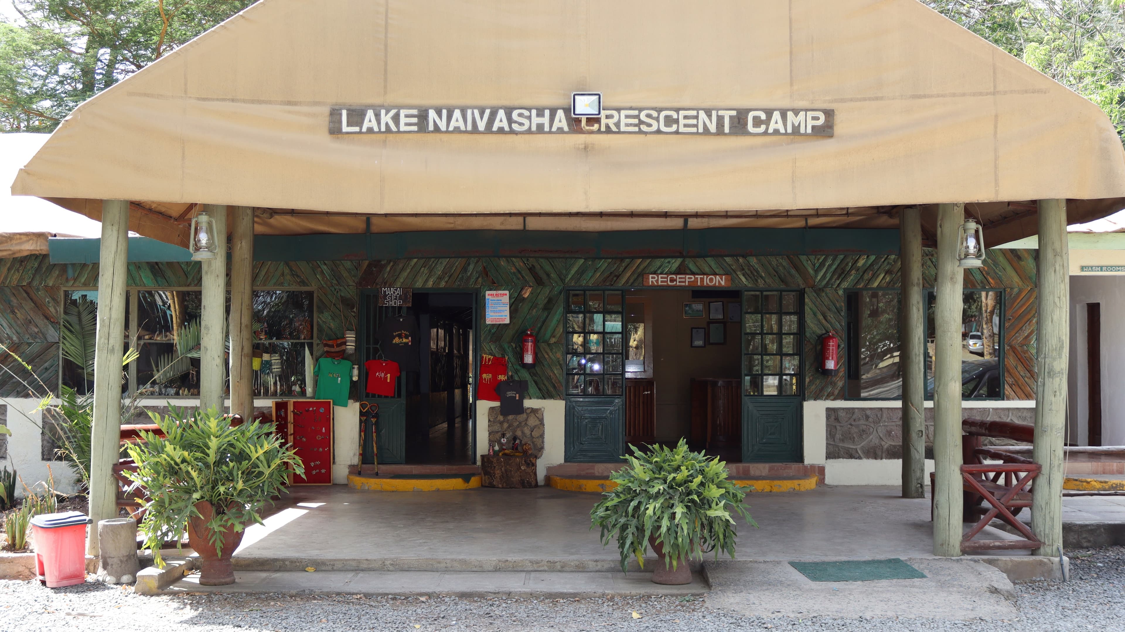 The reception building at Lake Naivasha Crescent Camp, with the camp's name on the canopy