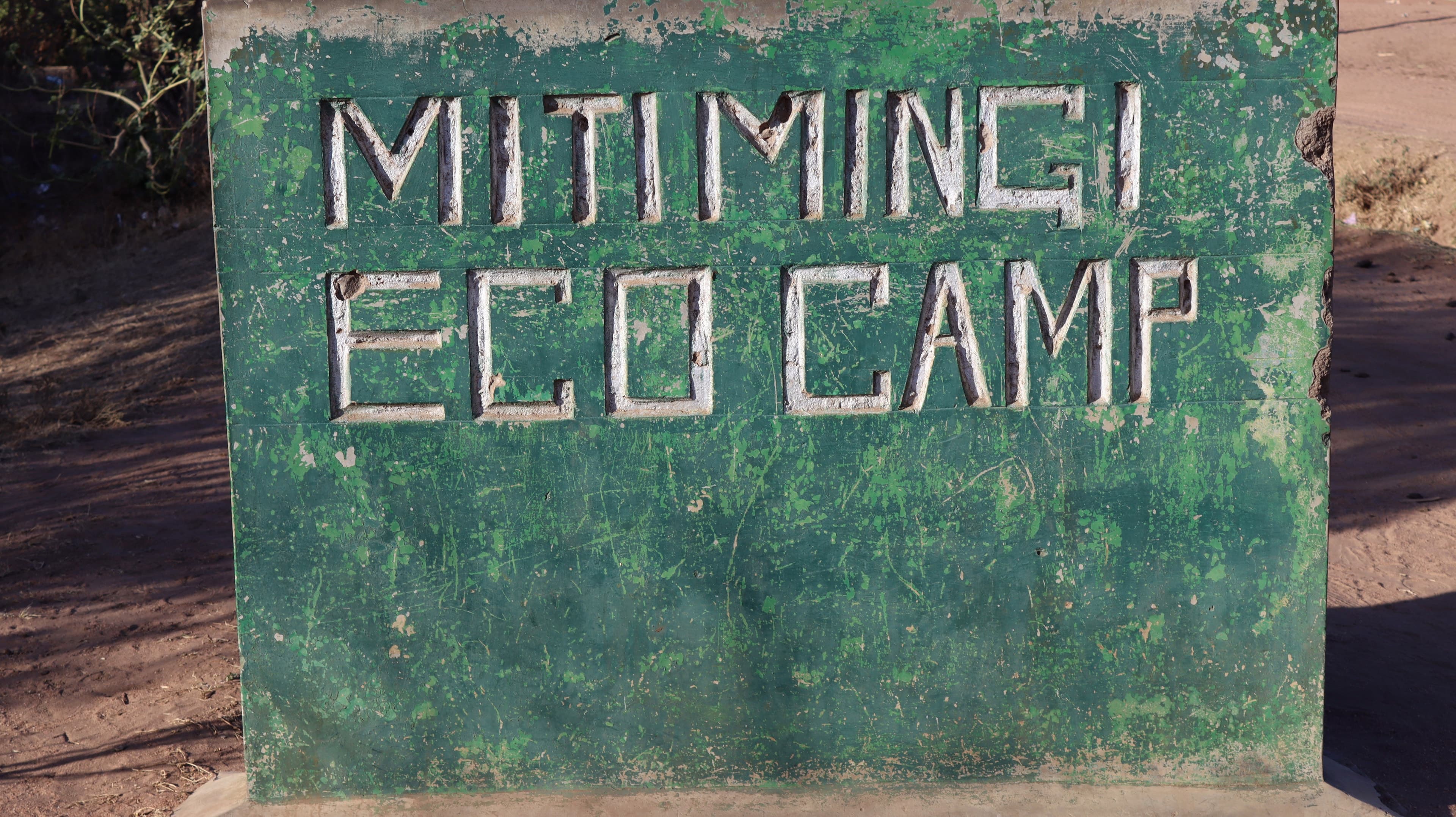The carved Miti Mingi Eco Camp sign
