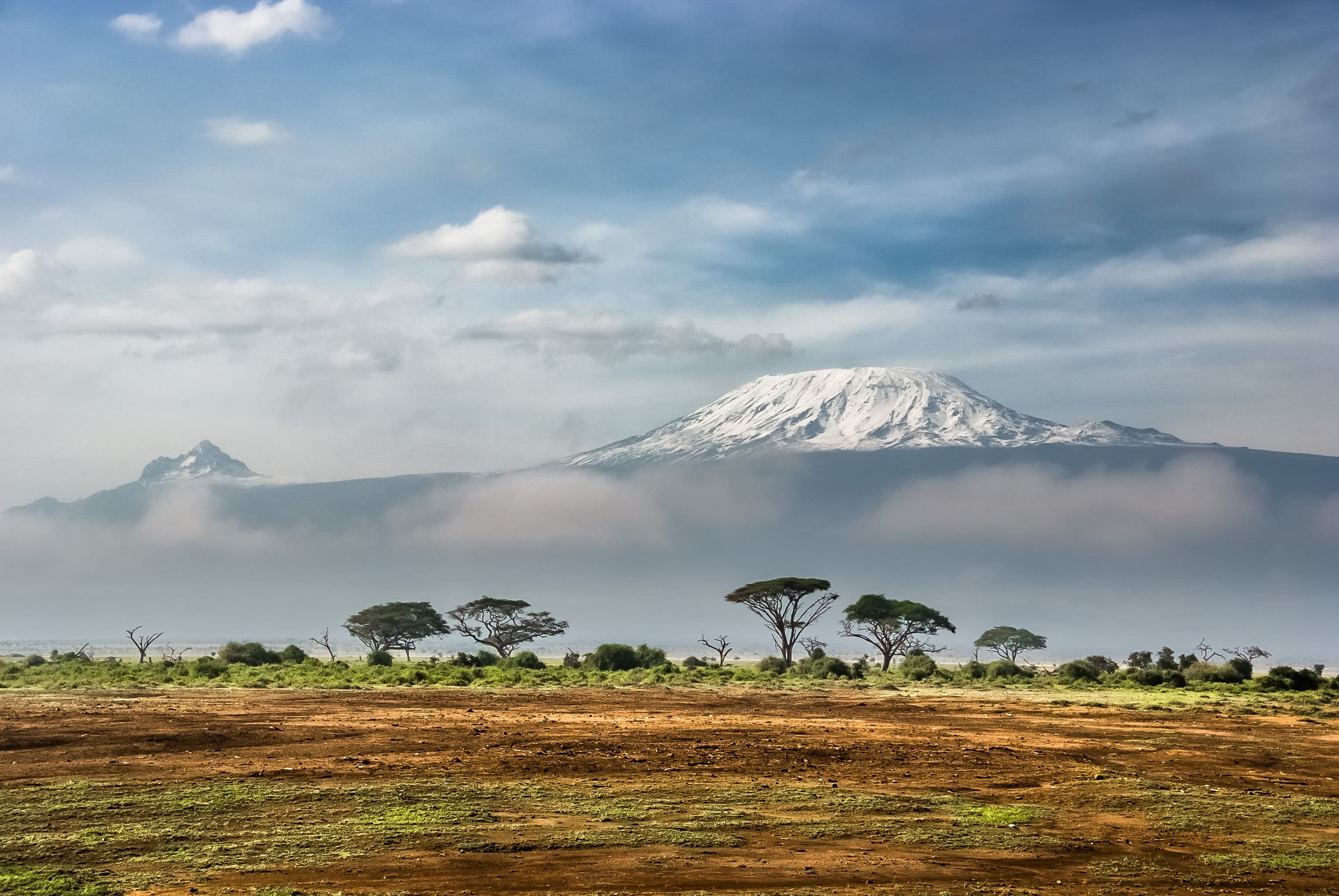 Mount Kilimanjaro seen across the plains of Amboseli National Park, Kenya