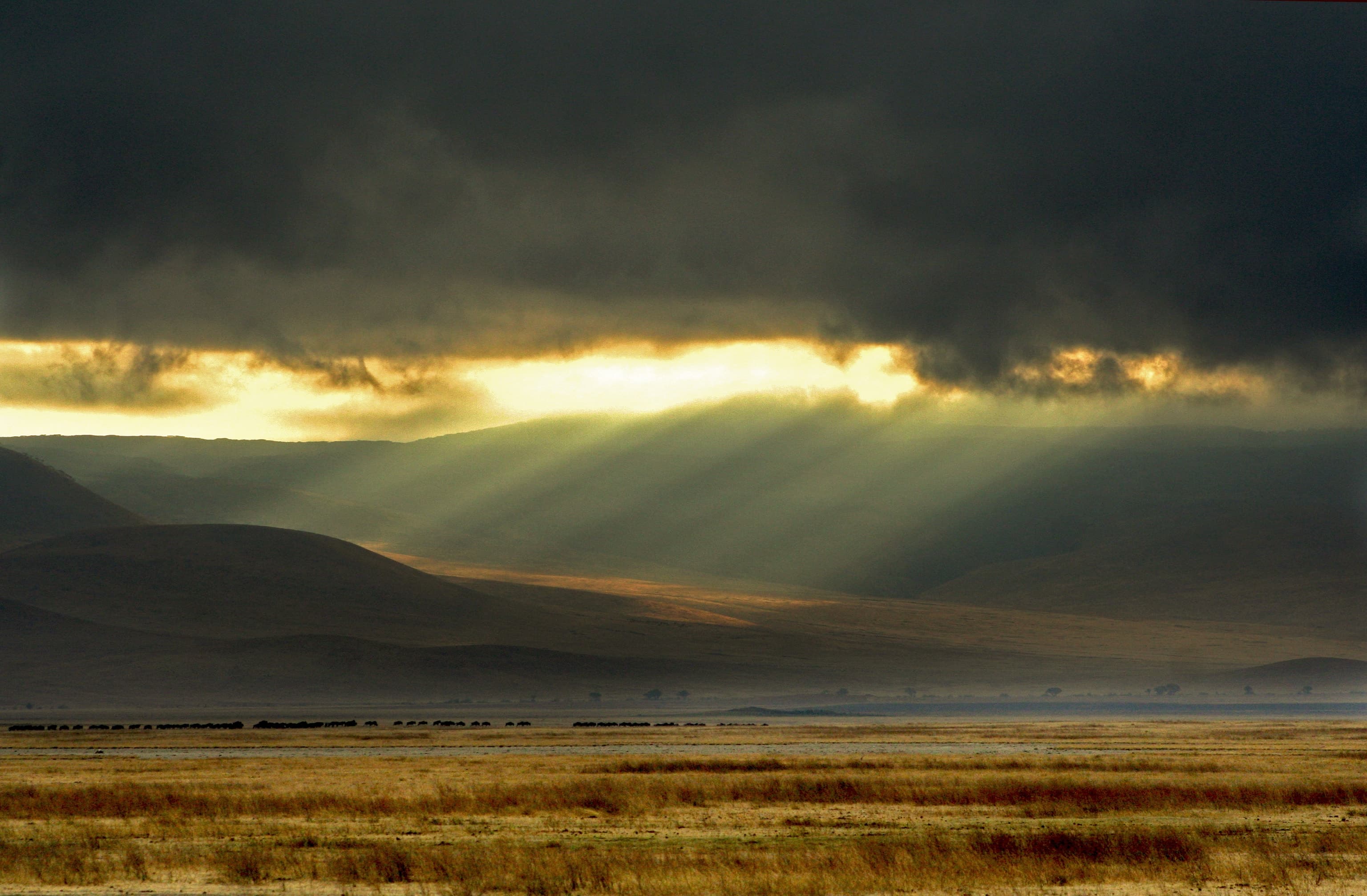 Light breaking through clouds over the Ngorongoro Crater, Tanzania